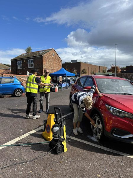🚗💦 Teamwork in Action: Our First Car Wash Fundraiser! 💦🚗